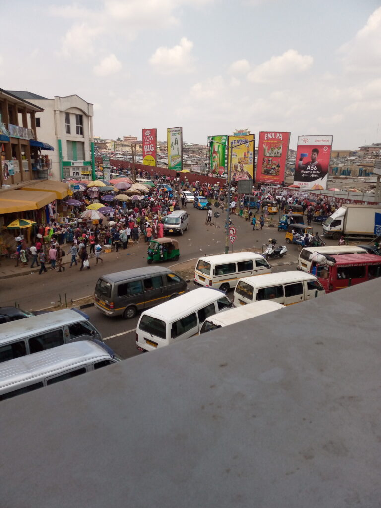 Kejetia area and busy road in Kumasi, Ghana