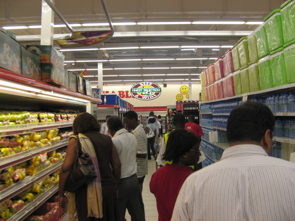 Shoppers in a supermarket in Accra, Ghana, the kind of retailer that sends receipts and restock alerts by SMS and WhatsApp
